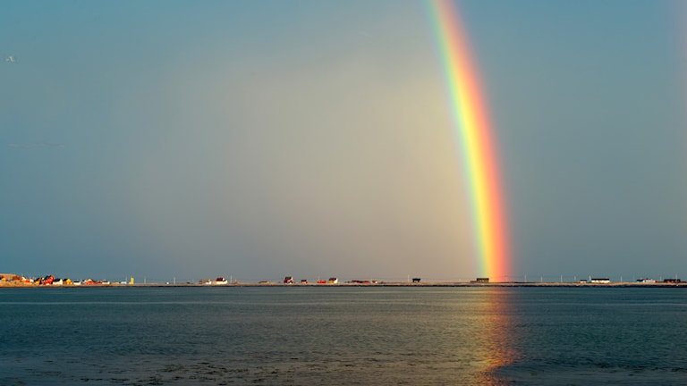 Midnattsol og regnbue
